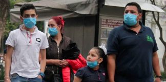 family with face masks