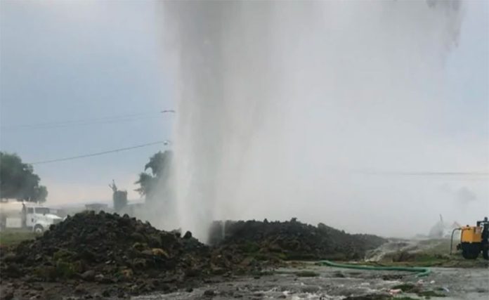Water gushes from a leak in the Cutzamala water system.