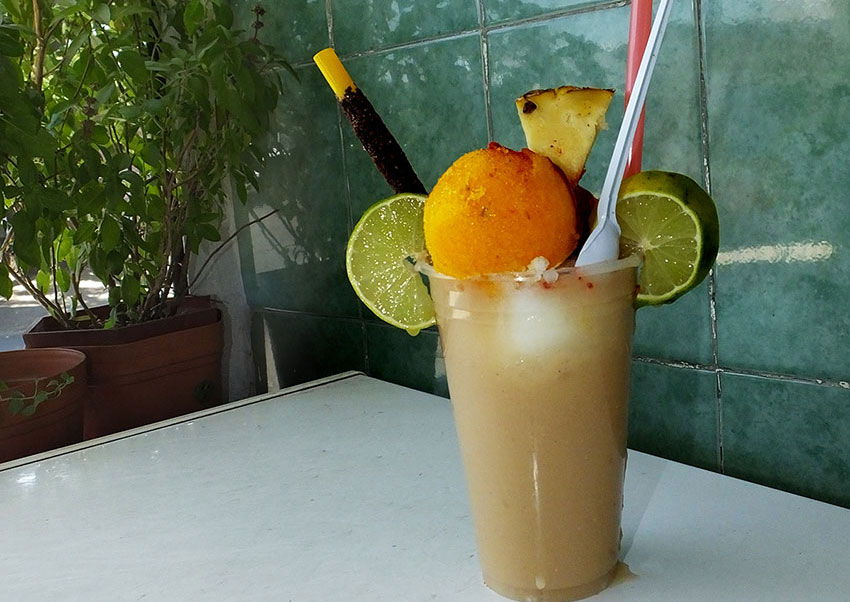 A tejuino float with scoops of mango and lemon sorbet.