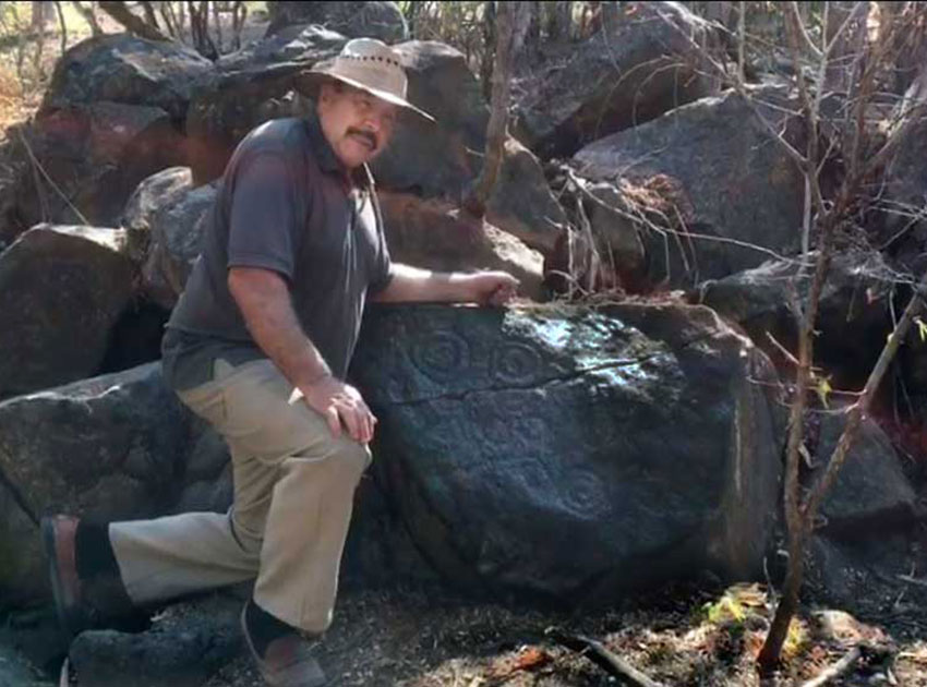 Gabriel Michel investigating petroglyphs near El Limón.