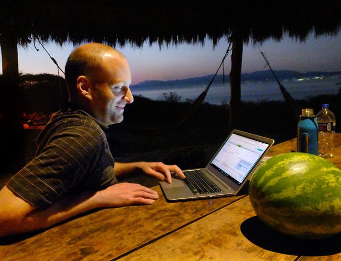 Laptops are fine for vacations, but long hours of use can cause back pain.