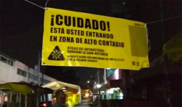 One of the warning signs in 89 areas of Mexico City that are considered high risk.