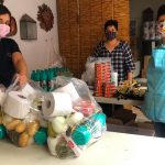 Volunteers prepare despensas in Marfil, Guanajuato.