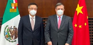 The Chinese ambassador, left and Ebrard.