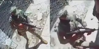 A National Guardsmen at the home of a man from whom he demanded money.