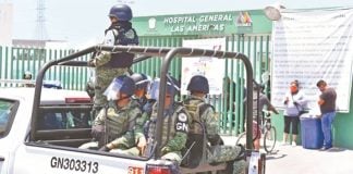 National Guard patrols outside hospital stormed by angry family members on Friday.