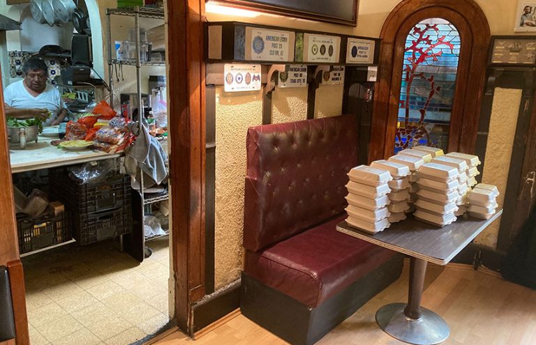The Legion bar's kitchen has been churning out packages of food for the needy.
