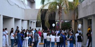 Co-workers of one of the victims held a memorial at the hospital where she worked.