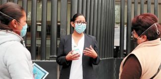 Nurse Martínez provides a link between Covid-19 patients and their families.