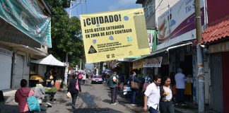 There are fewer people out and about in San Gregorio, where signs have gone up warning about areas of high contagion.