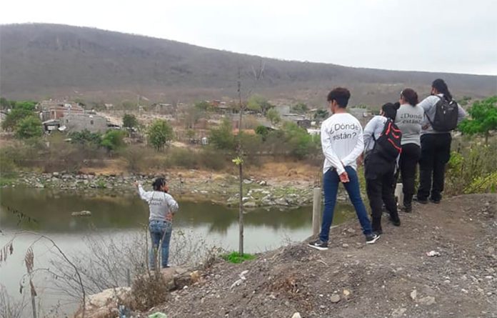 Wearing shirts bearing the message, 'Where are they?' Sinaloa searchers look for bodies.