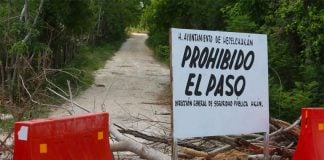 'Do not enter,' reads the sign outside Hecelchakán, Campeche.