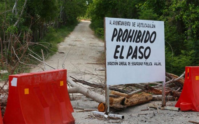 'Do not enter,' reads the sign outside Hecelchakán, Campeche.
