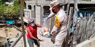 Both soldiers and sicarios distribute care packages in Mexico.