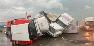 The wreckage of tractor-trailers after Friday's tornado.