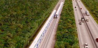 An artist's rendition of section four of the Maya Train, where it will run adjacent to the highway between Cancún and Izamal.