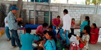 Farm workers on the road, heading north to find work.