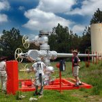 A capped steam well and silencer at Campo Geotérmico Cerritos Colorados in Jalisco.
