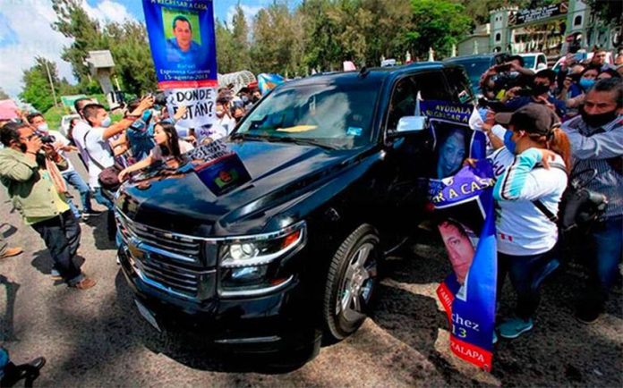 The president was greeted by protesters Monday in Xalapa, Veracruz.