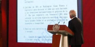 AMLO presents the anonymously-submitted document to reporters on