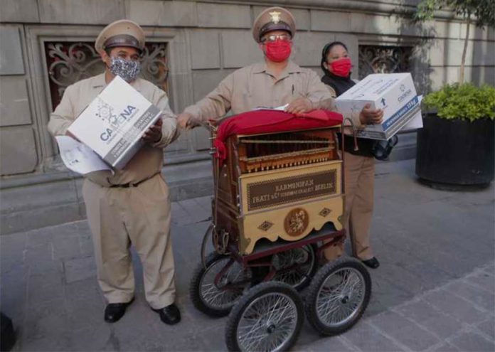 Organ grinders receive care packages in Mexico City.