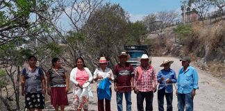 Citizens in Ahuacotzingo guard the entry to their village to control the coronavirus.
