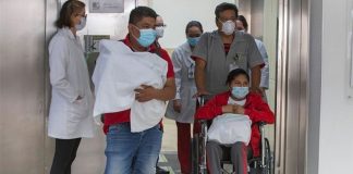 Ilse leaves the Mexico City hospital Saturday with her husband and their baby.