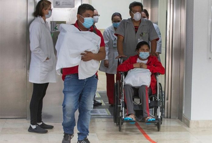 Ilse leaves the Mexico City hospital Saturday with her husband and their baby.