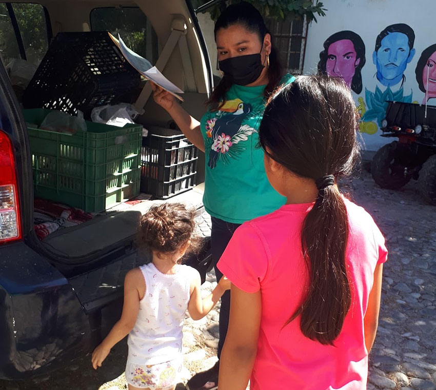 Delivering food supplies in La Cruz de Huanacaxtle.