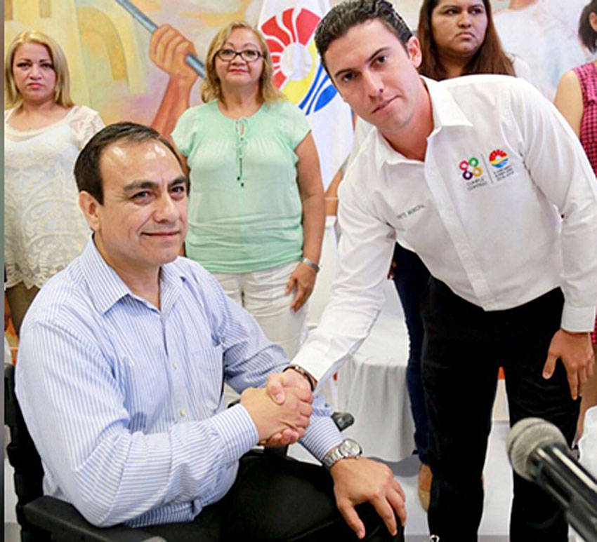 Leyzaola, is welcomed by the mayor of Cancún in 2017 after he was hired to clean up crime.