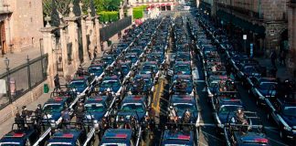Michoacán's new police vehicles on parade.