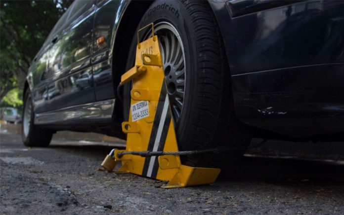 Tire clamps will be used on illegally parked vehicles in Metepec.