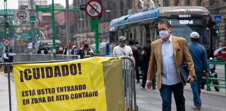 The sign in Mexico City warns that the area is high-risk for the coronavirus.