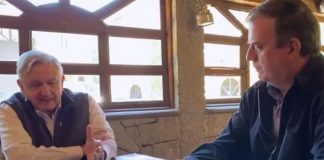 The minister's watch appears briefly in the video filmed Monday.