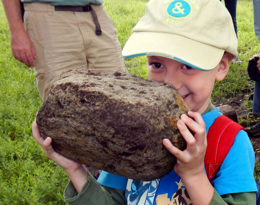 “This is pumice,” says a 6-year-old, lifting a rock which, although wet, is still light.