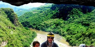The entrance to the cave, high above the Santiago River.