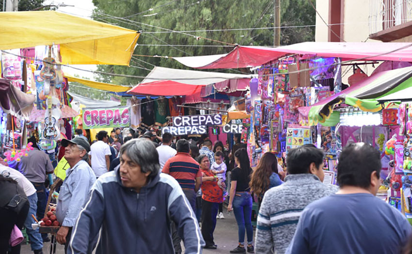 Bustling crowds during the town's fiesta in March.