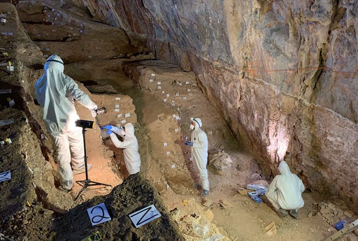 Researchers at work in the cave.