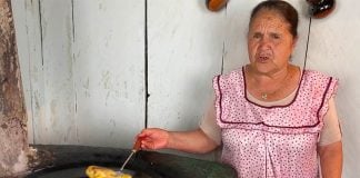 Doña Ángela in her rustic kitchen.