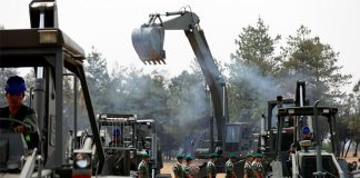 Army construction equipment at the Santa Lucía Air Force base.