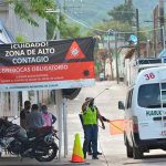 A van is sanitized upon entering town.