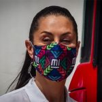 Trendsetting Mayor Sheinbaum sports a colorful face mask.