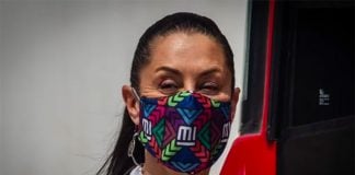 Trendsetting Mayor Sheinbaum sports a colorful face mask.