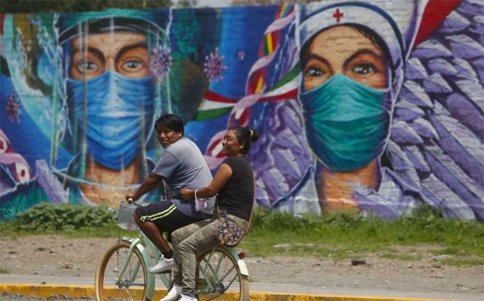 Mexico City continues to urge citizens to wear face masks as virus restrictions continue.