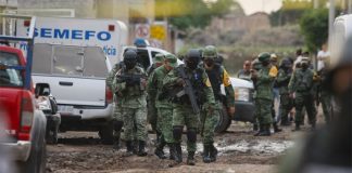National Guardsmen at the scene of the rehab centre massacre.