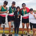 Ramírez, left, and fellow rowing competitors.