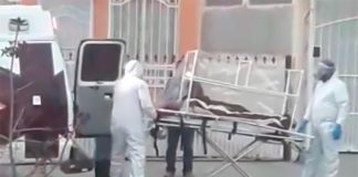 A patient with coronavirus symptoms is transferred to a hospital in Tijuana.