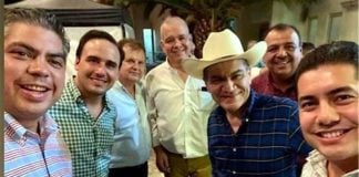 Coahuila Governor Riquelme, wearing hat, hosted a birthday party on Saturday.
