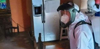 A home in which occupants were diagnosed with Covid-19 is disinfected in Xochimilco, Mexico City.