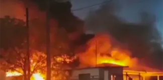 A government building burns in Delicias earlier this week.